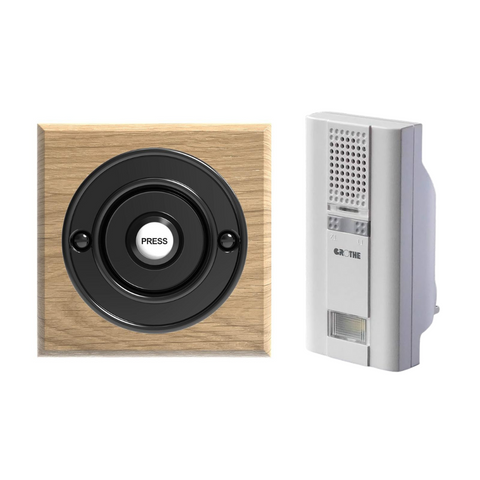 Wireless Black Bell Push on a Natural Solid Oak plinth with Grothe Long Range Plug-in Chime Unit